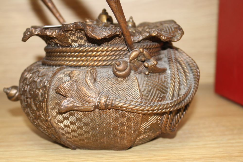 A Chinese iron teapot and cover, height 16cm